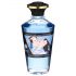 Shunga - šildantis masažo aliejus su kokosais (100ml)